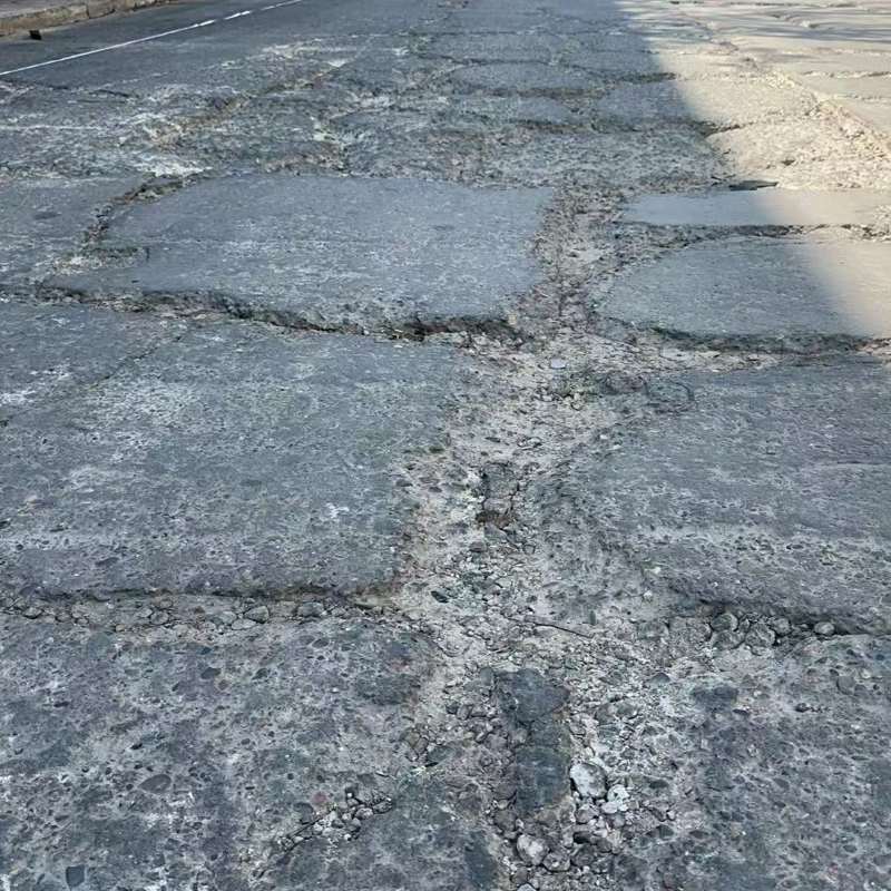 城子河路面起砂露石子修补料